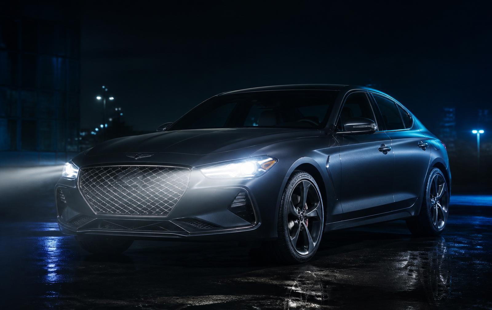 Restored headlights at night on a dark sedan
